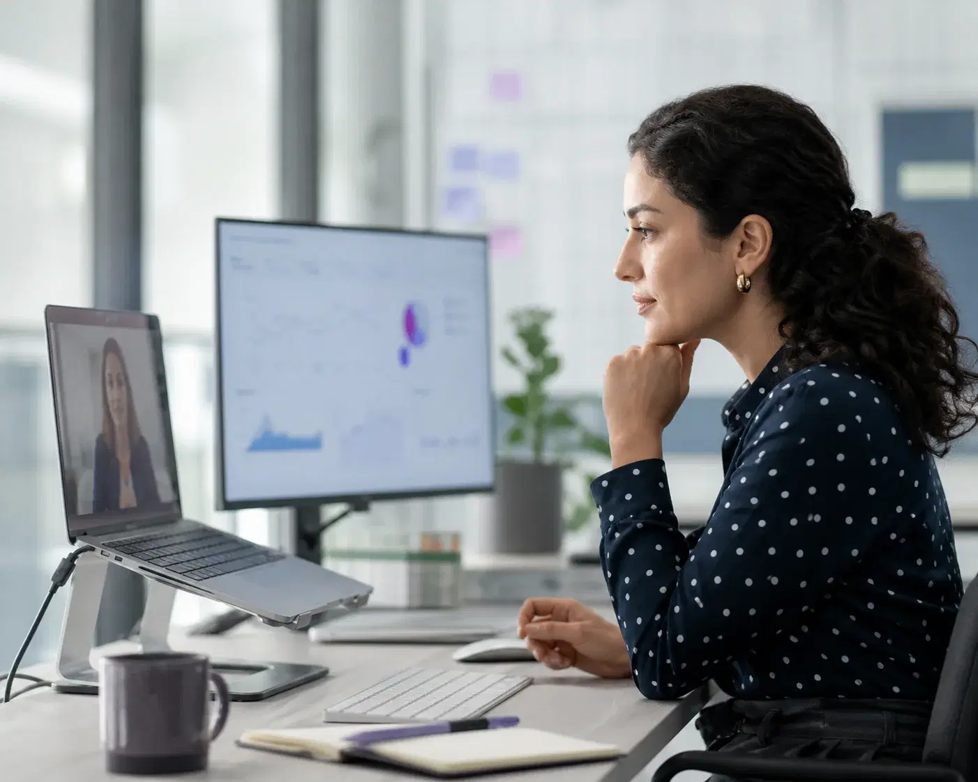 A hiring lead reviewing an interview while the conversation runs remotely